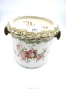 A Royal Doulton 'Burslem' lidded slop bucket decorated with roses, 12" diameter x 10" tall,