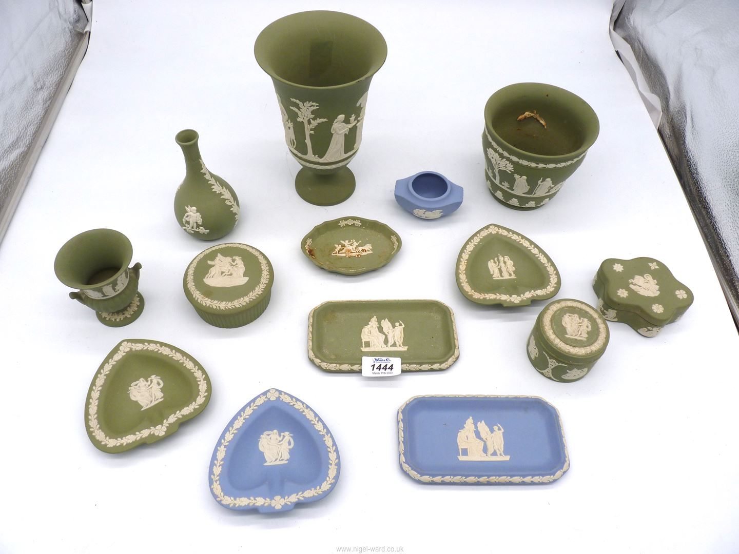 A quantity of Wedgwood Jasperware in green and blue including jardiniere, vases, pin dishes etc.