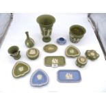 A quantity of Wedgwood Jasperware in green and blue including jardiniere, vases, pin dishes etc.