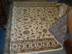 An ivory ground Cashmere carpet in all over floral pattern, 2m x 3m.