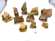 A quantity of Lilliput lane houses including Moreton Manor, Brecon Bach,