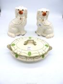 A pair of Staffordshire Mantle Spaniels in white (9 1/2'' tall) with some hairlines together with a