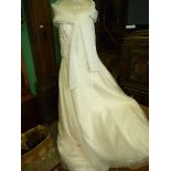 An Amanda Wyatt Wedding dress, 36" waist/38" bust and a stole, 86" x 16".