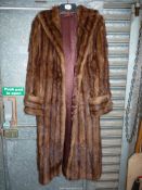 A long two tone fur coat.