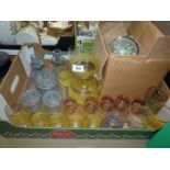 A quantity of glass including a yellow lemonade set, blue dressing table set,