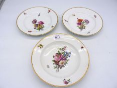 A set of three 18th century Doccia porcelain dishes painted with flowers including soup bowl,