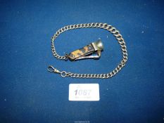 A silver Watch chain with tortoiseshell backed Cigar cutter.