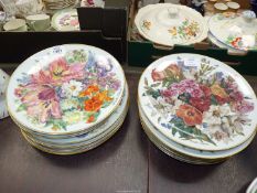 Four Bradex floral display plates from 'Grande Finale' series by Ursula Bond.