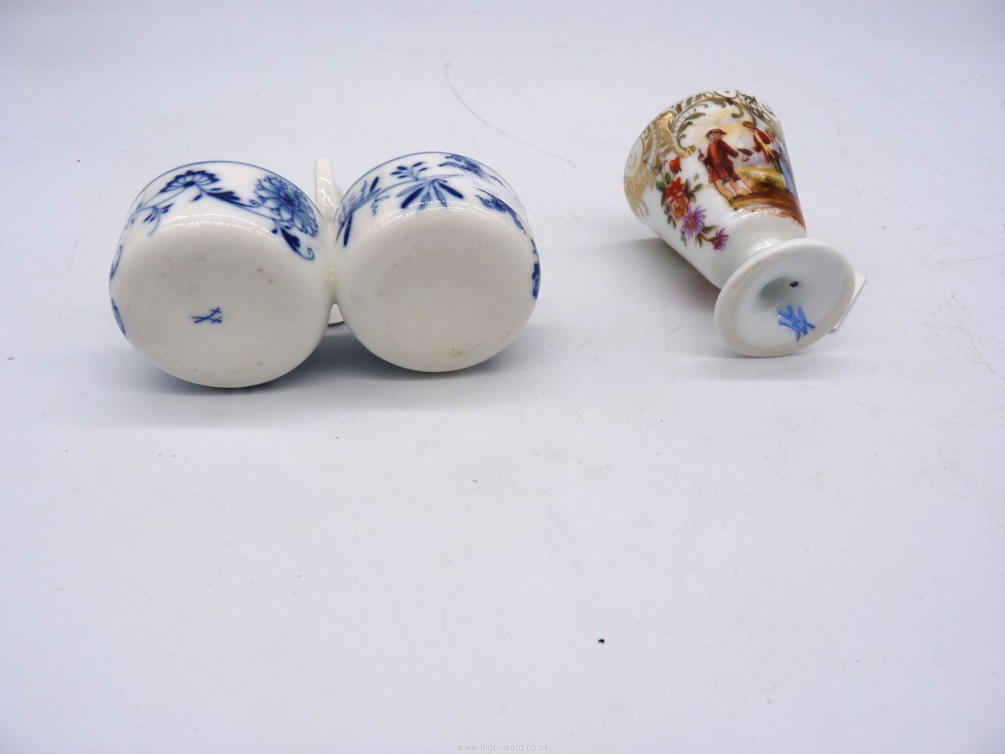 A pretty Meissen blue and white floral salt and pepper pots plus a continental miniature cup with - Image 2 of 2