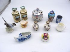A small quantity of china including two miniature silver topped vases,