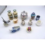 A small quantity of china including two miniature silver topped vases,