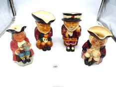 Four large character jugs including Beefeater, Aaron, Cottie etc.