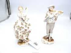 A pair of Dresden figures of a Flute Player and a Dancer