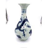 A Chinese porcelain blue & white octagonal "Dragon" vase, 16'' tall.