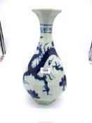 A Chinese porcelain blue & white octagonal "Dragon" vase, 16'' tall.