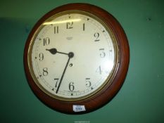 A Smiths Enfield wall clock with key, for repair, some scuff marks to the face,