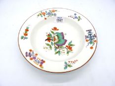 An 18th century Meissen soup bowl decorated in the kakiemon palette with the butterfly pattern,