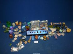 A quantity of mineral items in the form of moons, hearts, skulls etc.