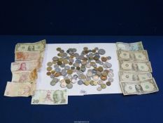 A quantity of foreign coins and notes including American dollars, Kroner, cents, tokens, Spain,