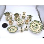 A quantity of Mason's 'Chartreuse' china including jugs, ginger jar, bells, dish etc.