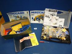 A quantity of Meccano and a cased set of model racing cars.