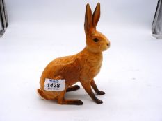 A Beswick Hare, foot has been repaired, model 1025, 7" tall.