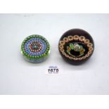 Two millefiori paperweights including Caithness by William Manson.