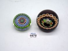 Two millefiori paperweights including Caithness by William Manson.