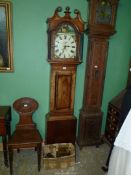 A cross-banded Oak Longcase Clock,