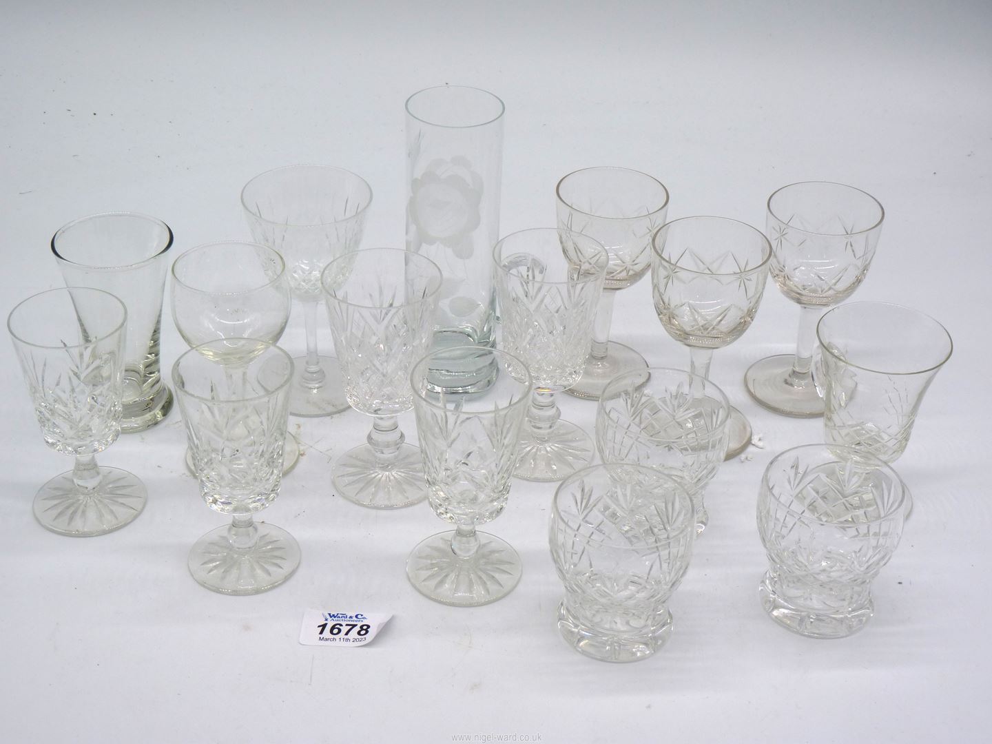 A small quantity of sherry/port glasses, plus an handled etched glass.