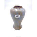 An Ashby Guild art pottery vase in pale blue with beige streaks, impressed mark to base, 10" tall.