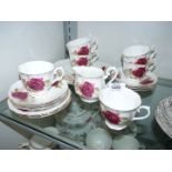 A red rose pattern bone china part Teaset for six.