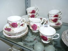 A red rose pattern bone china part Teaset for six.