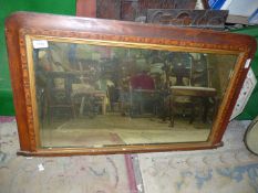 An overmantle Mirror with inlaid wood frame, 34'' wide x 21 3/4'' high.