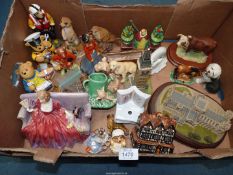 A large quantity of china animals, figures and buildings including Royal Doulton "Sweet & Twenty",