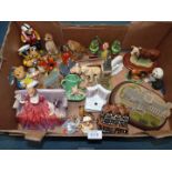 A large quantity of china animals, figures and buildings including Royal Doulton "Sweet & Twenty",