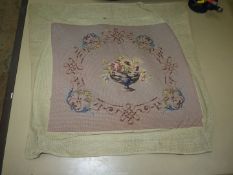 A tapestry and petit point worked Cushion cover, the work almost complete.