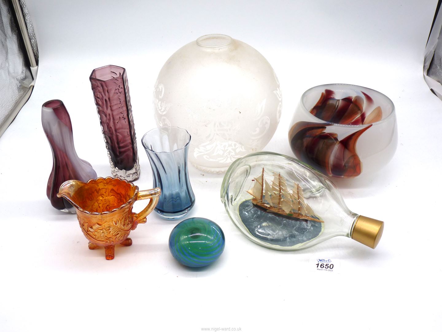A small quantity of coloured glass including a signed Karlin Rushrooke Studio glass bowl,
