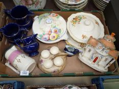 A quantity of china including egg cups and stand, pastille burner, lidded serving dishes,
