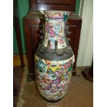 A large Chinese Cantonese vase painted with warriors, some damage.