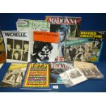A quantity of Rock and pop related memorabilia including Beatles, Madonna etc.