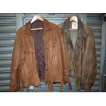 A well worn brown leather Jacket with side pockets and popper fastenings,