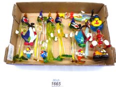 Twelve miniature Murano glass clowns