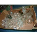 A quantity of miscellaneous glass including storage jars and lids, small miscellaneous tumblers,