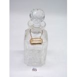 A cut glass Stuart Crystal square Decanter with stopper having a silver (Sheffield) decanter label