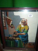 A Needlepoint picture of Vermeer's 'Milkmaid'.
