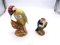 Two Beswick Woodpeckers including Lesser Spotted, tail repaired to tallest bird (8 1/2" tall).