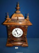 An attractive antique German Mantle clock in need of some restoration, 7" wide x 22" tall.