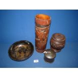 Four oriental items including a treen bamboo cylindrical pot (double ended) having a samurai figure