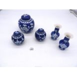 A pair of Chinese blue & white baluster shaped vases in prunus pattern,